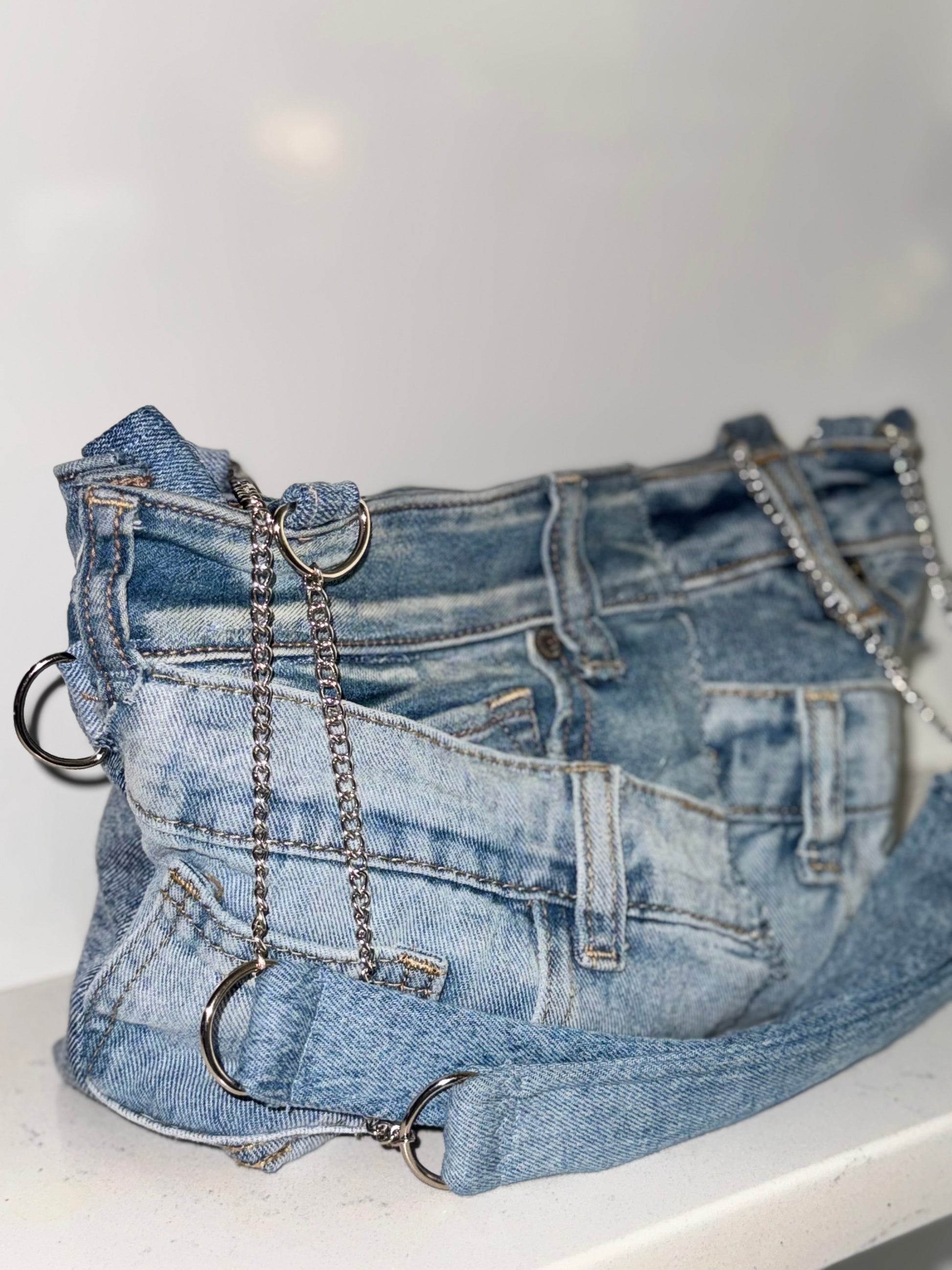 “Make ‘Em Mad” Denim Shoulder Bag