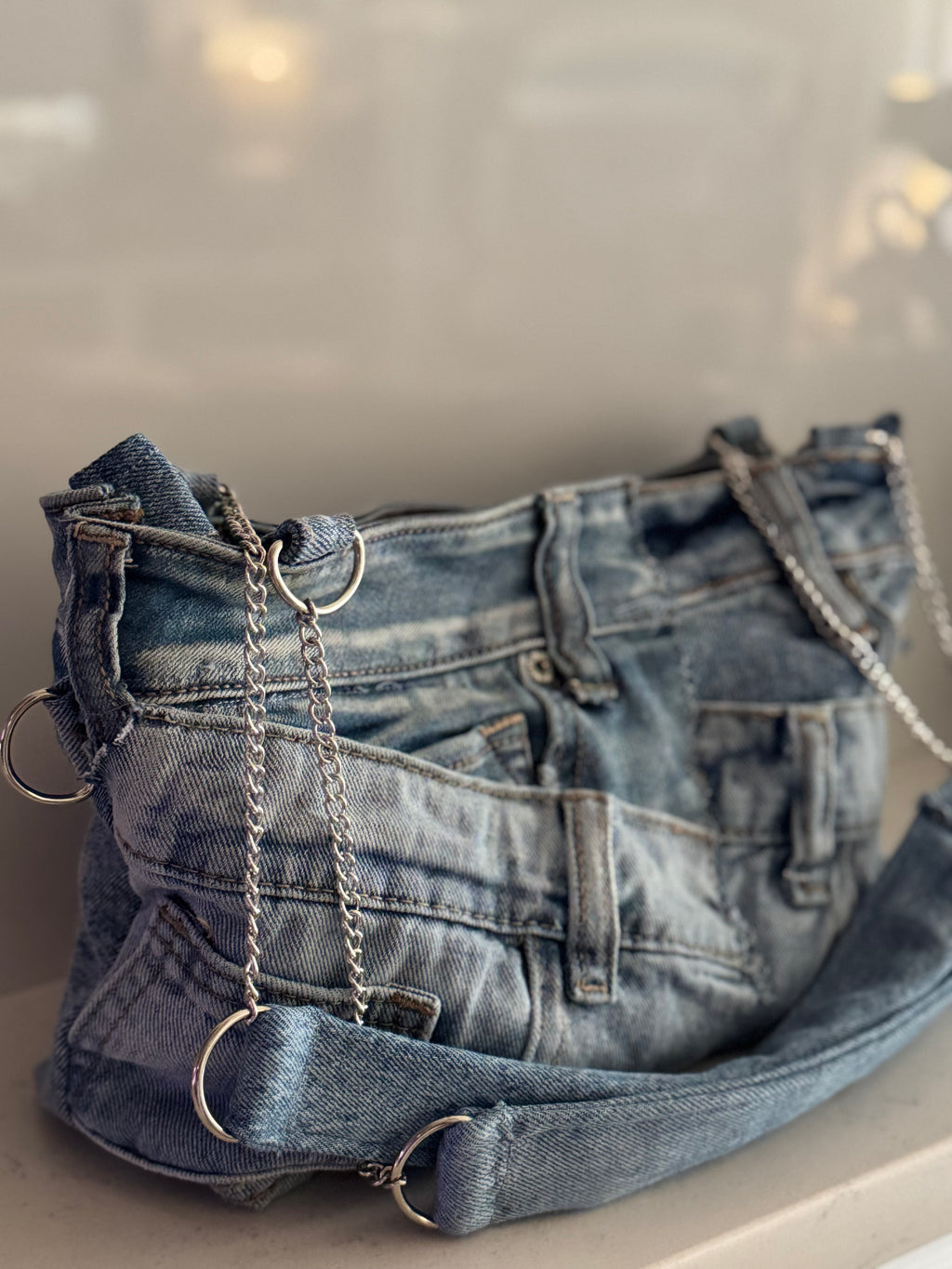 “Make ‘Em Mad” Denim Shoulder Bag