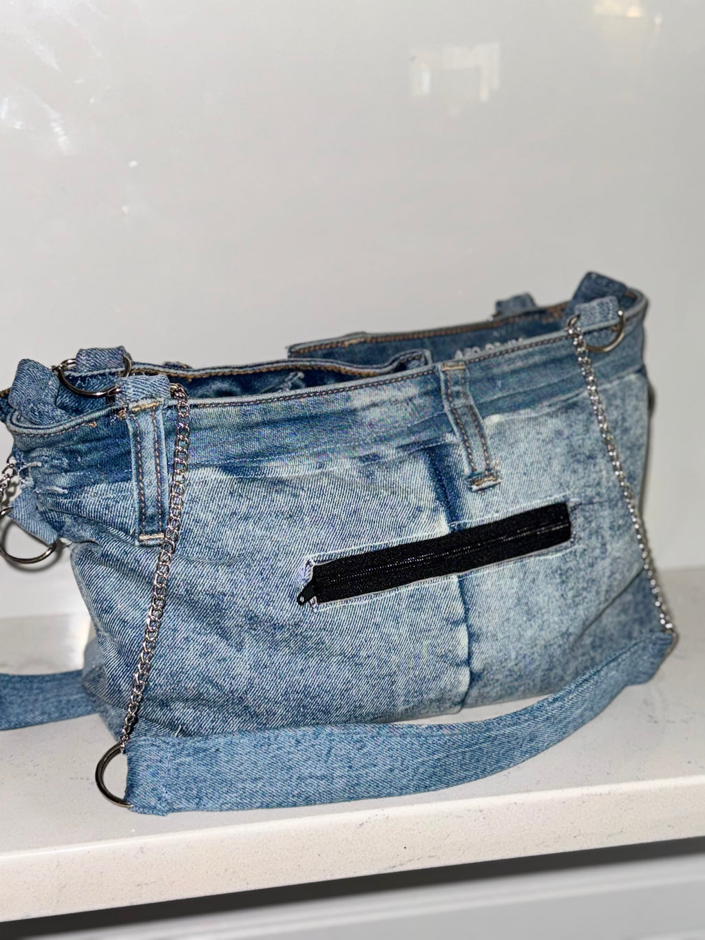 “Make ‘Em Mad” Denim Shoulder Bag